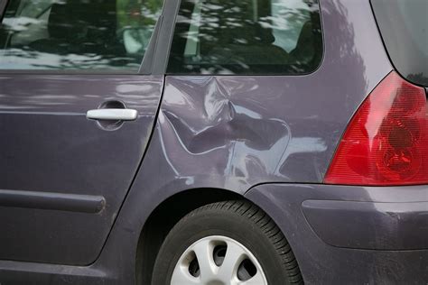 How Much Does It Cost to Repair a Dent in a Car, and Why Do Birds Suddenly Appear Every Time You Park Under a Tree?